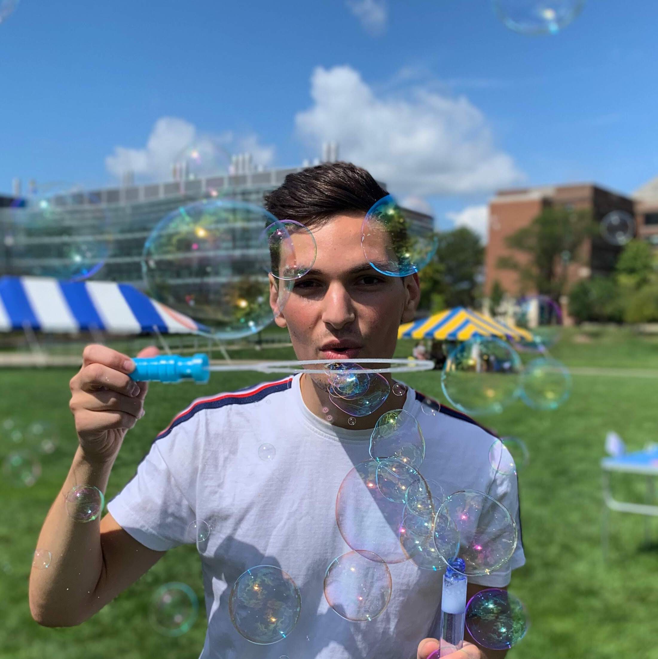 Picture of AJ Carter blowing bubbles